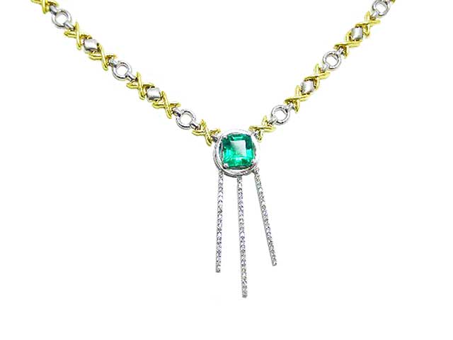 White and yellow gold necklace with emeralds