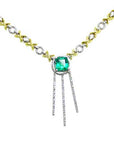 White and yellow gold necklace with emeralds