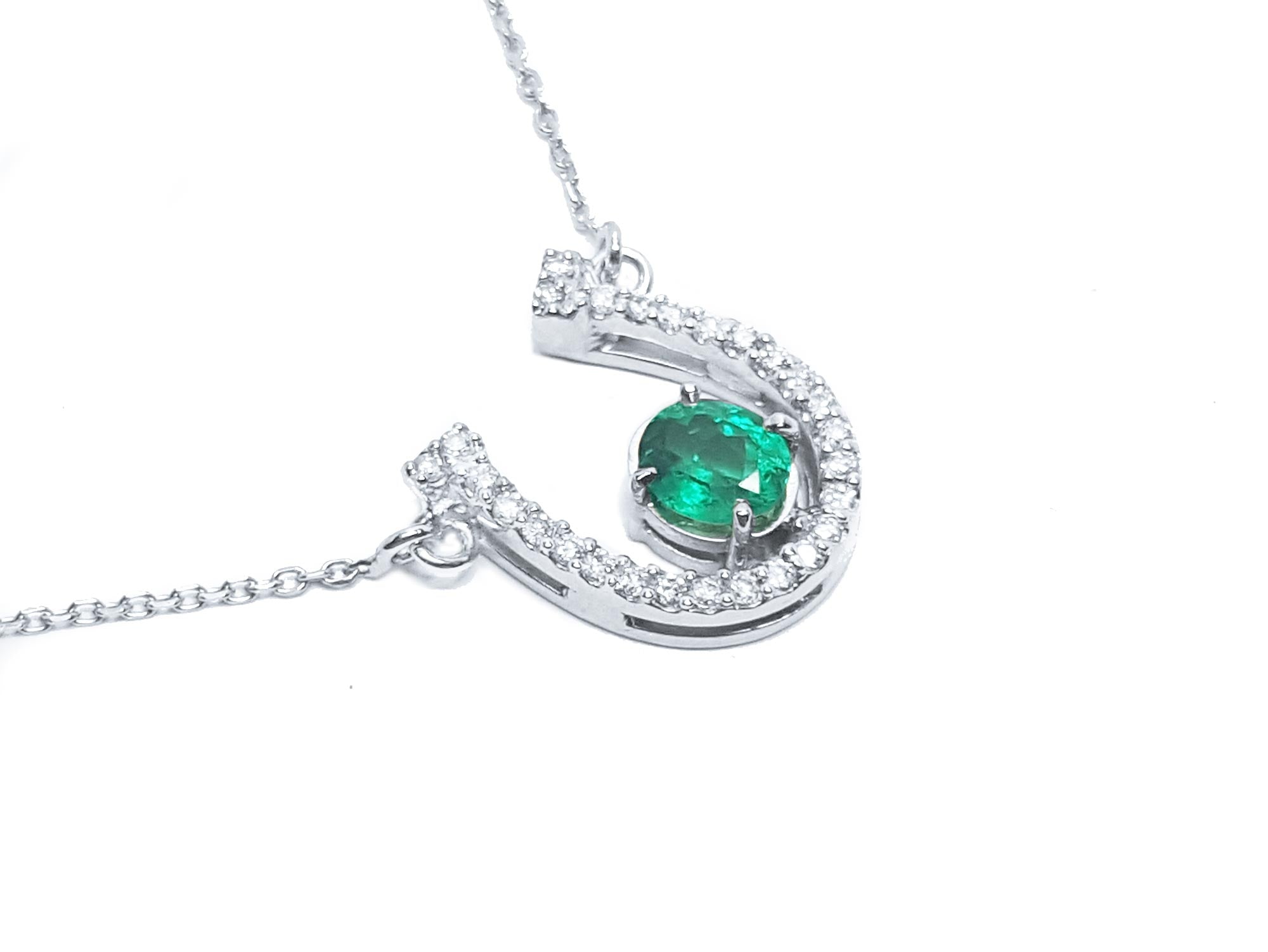 Horseshoe emerald necklace