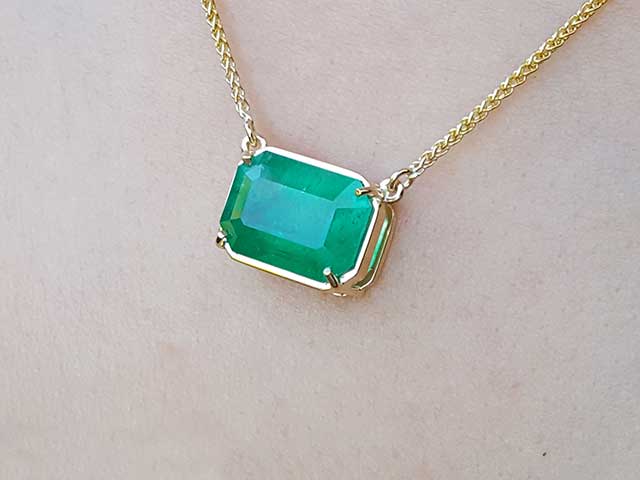 Solid yellow gold emerald solitaire necklace