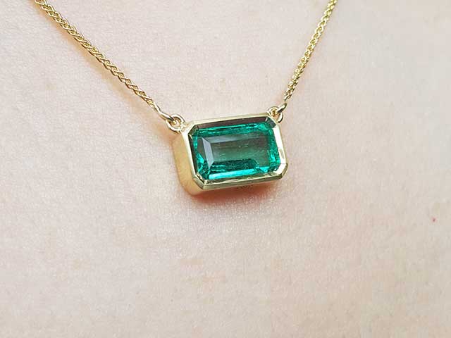 Genuine Colombian emerald bezel set necklace