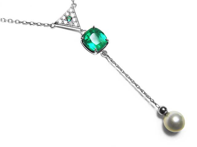 Pear with emerald necklace