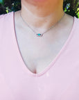 White gold emerald necklace