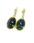 Ethiopian Welo black opal oval earrings with bluish-green and red-orange fire, set in 14K yellow gold.