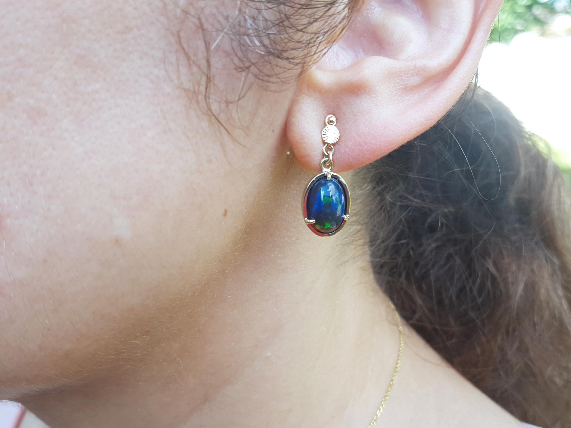 Dangling opal earrings