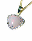 Opal pendant made in solid gold