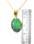 Yellow gold opal pendant
