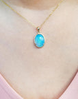 Yellow 14k gold opal pendant