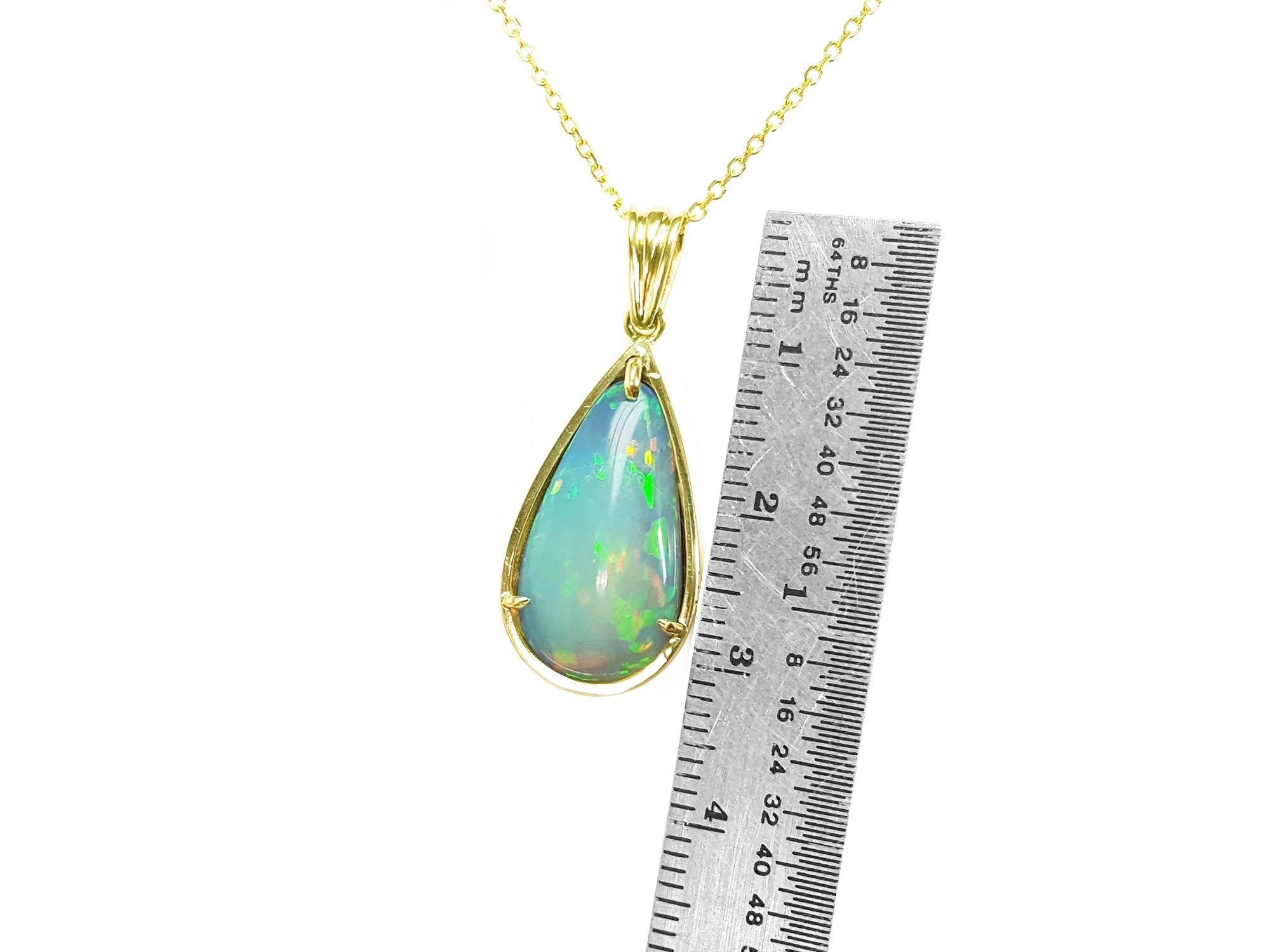 Yellow gold Ethiopian opal pendant