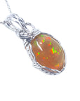 7.67 ct. Ethiopian Opal Pendant Vibrant Full Play of Colors Wire Wrap Silver