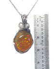 7.67 ct. Ethiopian Opal Pendant Vibrant Full Play of Colors Wire Wrap Silver