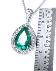 Real emerald and gold pendant