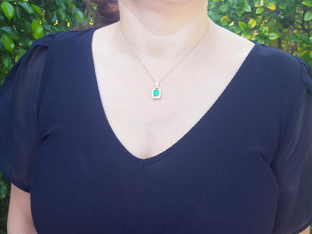 Emerald-cut emerald pendant
