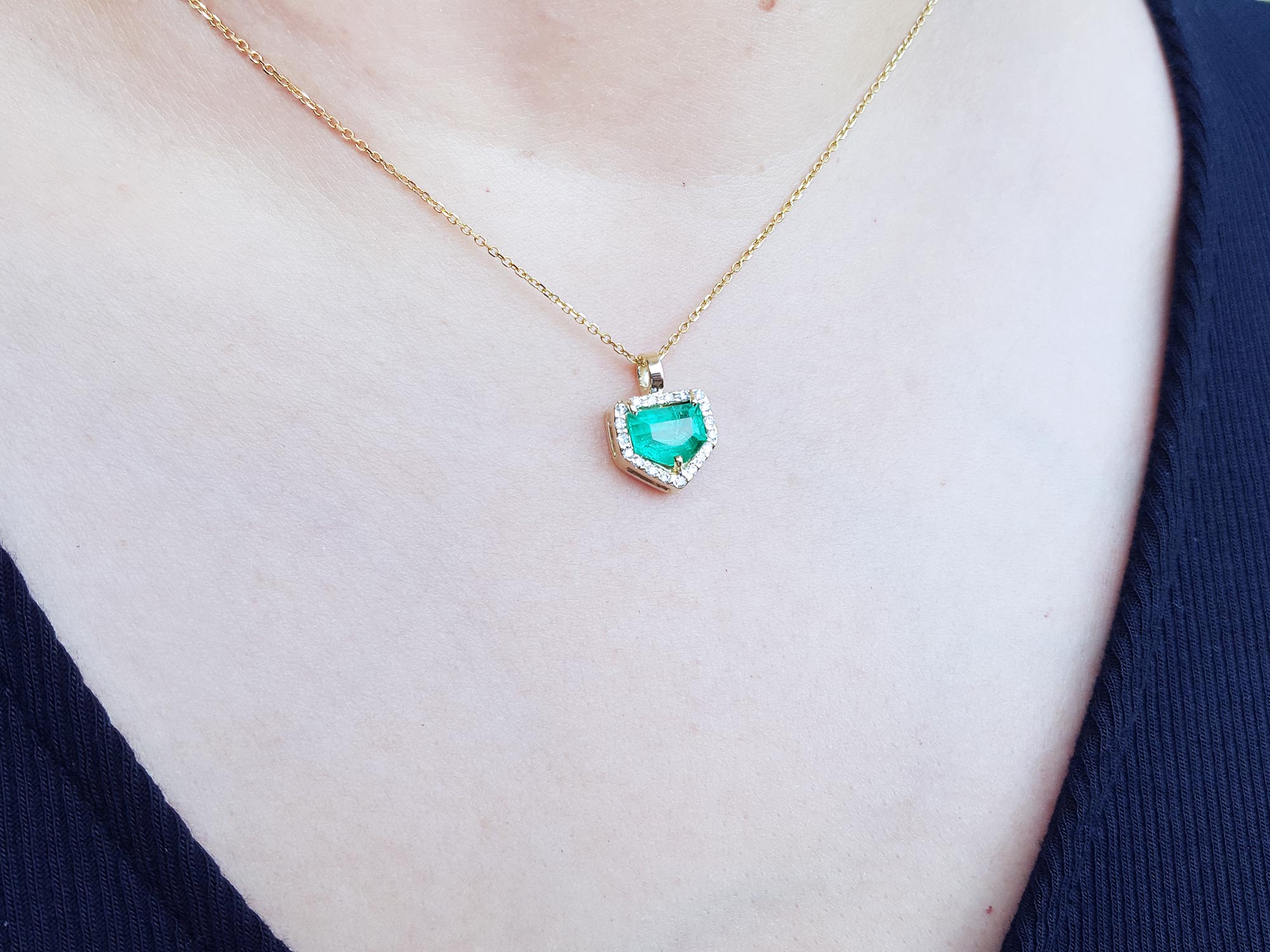 Halo emerald pendant