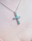 18k gold emerald cross pendant