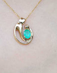 Emerald and solid yellow gold mother and chil pendant necklce