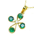 Gold cross emerald pendant