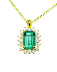 14k yellow gold necklace with a rectangular natural colombian emerald with halo diamond pendant.