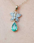 Butterfly solid gold emerald pendant necklce