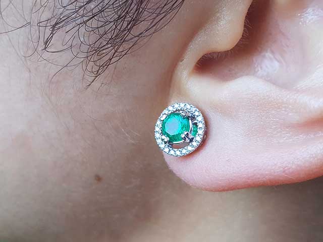 Colombian emerald and halo diamond stud earrings