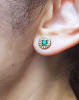 Yellow gold halo emerald stud earrings