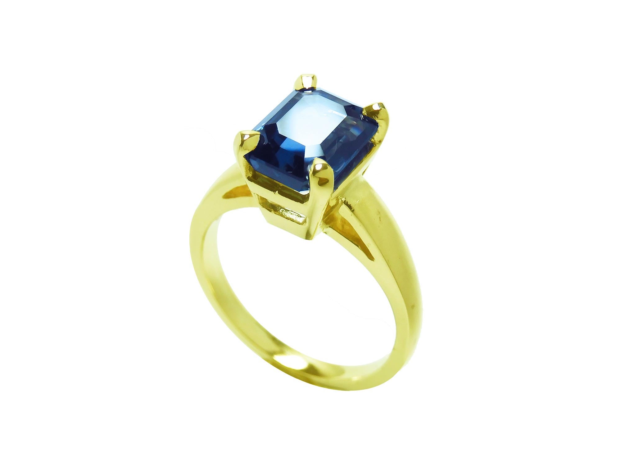Yellow gold sapphire solitaire ring