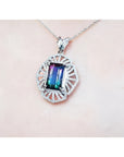 4.90 ct. rectangular watermelon tourmaline pendant with diamonds on a 14K white gold necklace.