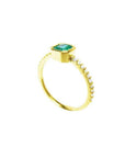 14K yellow gold ring with a square-cut Colombian emerald in a tapered bezel, flanked by natural diamonds.