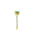 14K yellow gold ring with a medium green emerald in a tapered bezel and diamond-accented band.