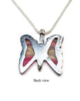 Back view of a silver butterfly agate pendant with pink wings on a silver chain.