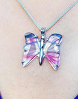 Handcrafted butterfly agate pendant necklace with pink wings, made of 925 sterling silver.