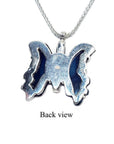 Back view of dark blue natural agate butterfly pendant in sterling silver.