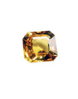 Asscher cut loose yellow sapphire natural gemstone, right-side position displaying able and crown