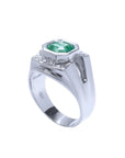 Men's 18K white gold ring with a bezel-set, vibrant bluish-green asscher-cut emerald.