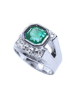 A top and side perspective of a white gold mens asscher cut emerald ring.