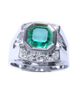 This asscher cut men's emerald ring in white gold with accent diamonds displays the top and sides profile.