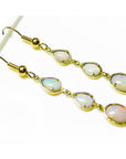 Handcrafted 14k yellow gold dangle earrings with three pear and oval-shaped natural Australian opals.