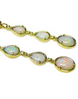 Handcrafted 14k yellow gold earrings with three pear and oval-cut natural Australian opals.