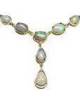 Handcrafted Australian opal necklace with 3.94 ct solid opals in 14K yellow gold, featuring a Y-drop design.