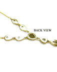 Back view of a 14k yellow gold necklace with teardrop links and an oval setting.