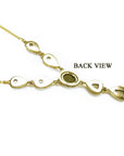 Back view of a 14k yellow gold necklace with teardrop links and an oval setting.