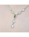 14k yellow gold necklace with a black Australian opal haloed by diamonds, surrounded by teardrop opals.