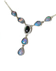 14k yellow gold Australian black opal and diamond halo necklace with pear-shaped opals.
