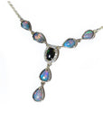 14k yellow gold Australian black opal and diamond halo necklace with pear-shaped opals.