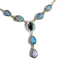 14k yellow gold necklace with a black Australian opal haloed by diamonds, and seven pear-shaped opals.
