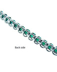 Back view of a Colombian emerald tennis bracelet in 14K white gold, showing the setting.