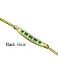 Back view of a 14K yellow gold bracelet with five emerald-cut Colombian emeralds.