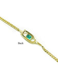 14K yellow gold bracelet with a square emerald-cut Colombian emerald.