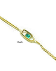 14K yellow gold bracelet with a square emerald-cut Colombian emerald.