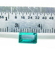 Baguette cut loose natural Colombian emerald, with ruler for measuring size
